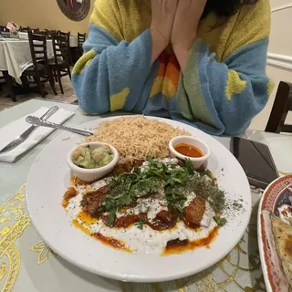 Borani Banjan entree served with Rice and Salad