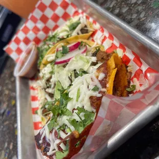 Carne asada, ground beef and birria queso taco