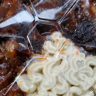 Bowl FULL!! Oxtail and white rice with macaroni salad.