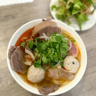 Bun bò Hue (spicy beef noodle soup) - lots of toppings :)