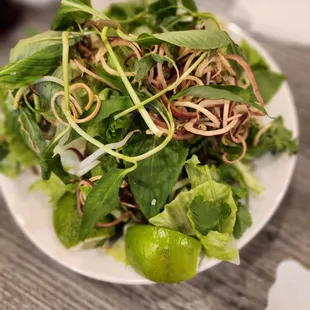 a plate of salad on a table