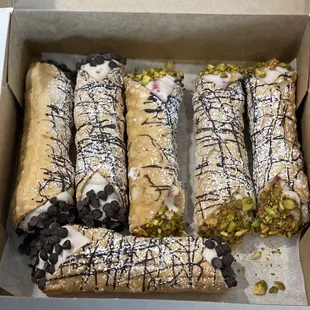 OMFG YES!!!! Fresh raspberry cannoli!!!! I took a bite at my car i could not freakin wait Hah!!! Insanely delicious...