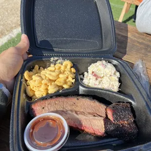 Bbq from 225 degrees bbq.  Brisket, potato salad, and Mac and cheese