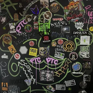 a door covered in stickers