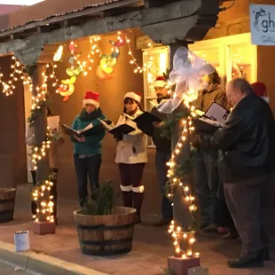 Caroling outside the gallery during Holiday Stroll 2016