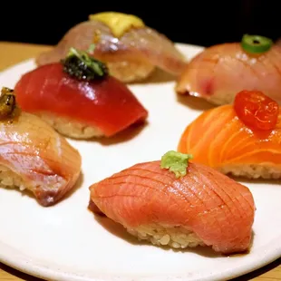 Nigiri Plate: bluefin tuna, salmon, hamachi (yellowtail), shima aji (striped jack), hirame (fluke) ($29). Added toro (fatty tuna) for $11.