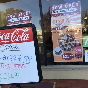  sign in front of a restaurant