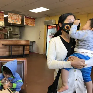  woman holding a child in her arms