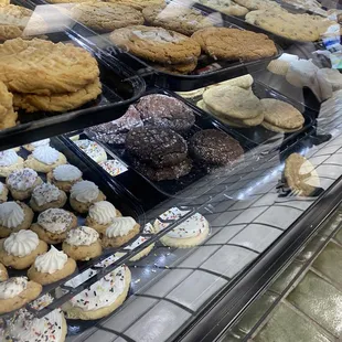 a display of cookies and pastries