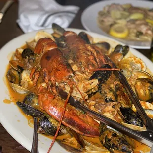 a plate of seafood with a fork