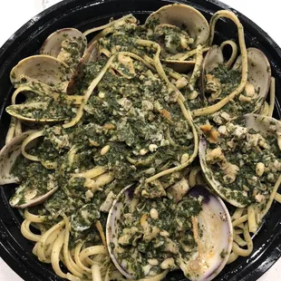 a plate of pasta with clams