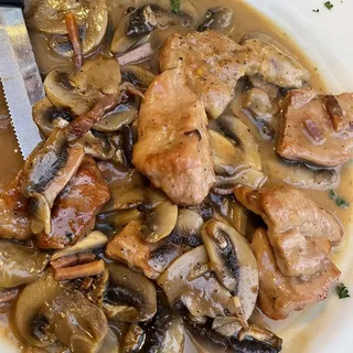 Veal Sauteed with Mushrooms and Prosciutto