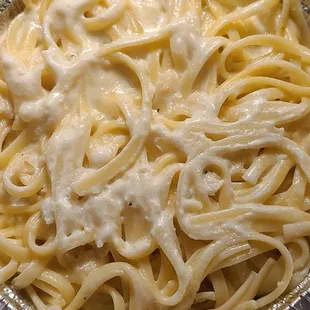 Fettuccine alfredo as the side with my veal picatta delivered by uber