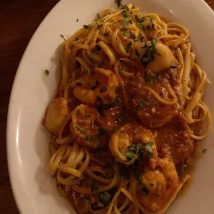 Shrimp and Scallops over Linguine with Fracomo sauce.
