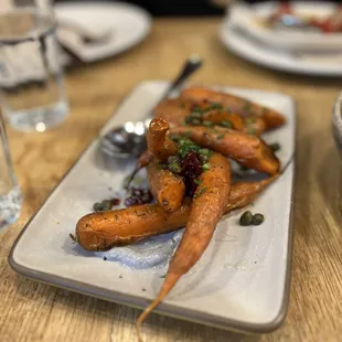 a plate of carrots and a salad