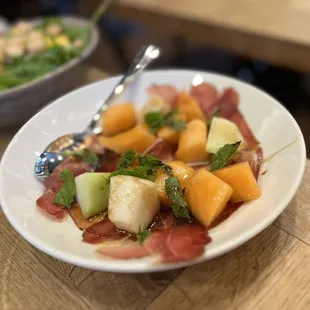 a plate of fruit salad