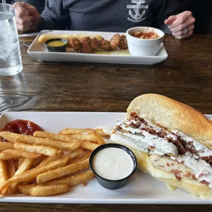 Chicken spiedini with a side of bow tie pasta in marinara