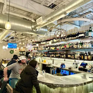 people sitting at the bar