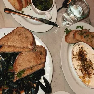 Stracciatella toasted crushed pistachios, olive oil, honey, sea salt. Mussels' tomatoes, calabrian, lemon, garlic, white wine, herbs, toast