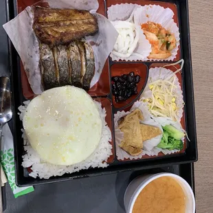 a bento box of food