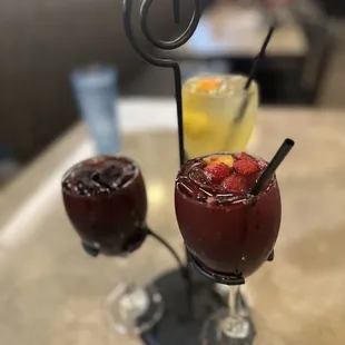 Sangria flight- Orange mango, Twisted tropical Punch, and Blackberry Pomegranate