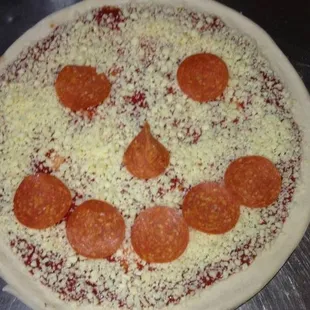a pizza with pepperoni and cheese
