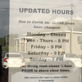 New hours posted on their door - September 2021