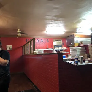 a woman standing in a restaurant