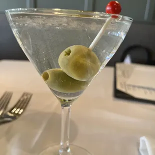 a martini with olives in it