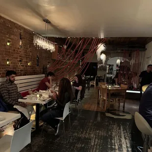 a group of people sitting at a table