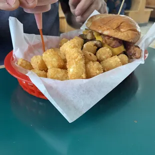 Giant burger with tator tots