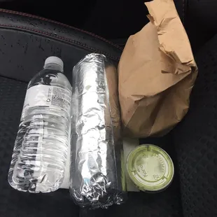 I had the GIANT BURRITO which came stuffed with sour cream, beans, rice, cilantro, and Asada See water bottle for size reference