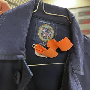 Orange tag with military crease on it (which I definitely didn't ask for, especially for the ODU pants).