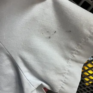 Random stain/black marks on my short sleeve light blue shirt