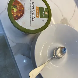 a bowl of soup and a spoon