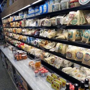 fancy cheese cold case with plentiful options