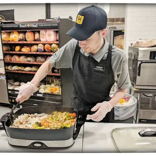 A chef prepares a vegan stir fry dish. Each day, they feature a new recipe and dish to sample for dinner inspiration.