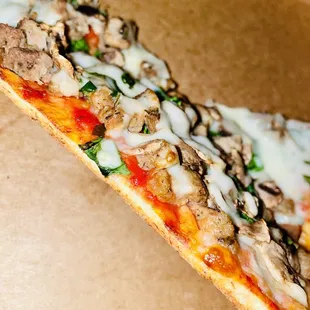 Thin crispy delicious pizza: sausage, mushroom &amp; spinach. :P