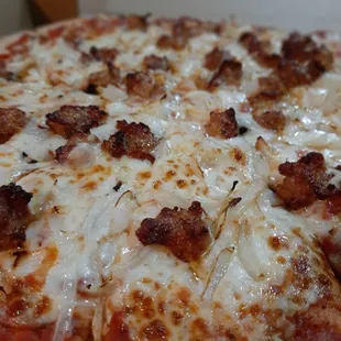 Large pizza with Sausage and onion
