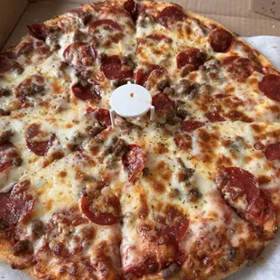 Pepperoni and sausage pizza