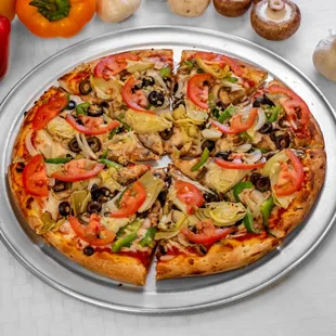Vegeterian Pizza: Mushromms, Green Bell Peppers, Onions, Olives, Artichoke Hearts, Garlic and Fresh Tomatoes.