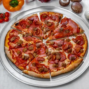 a whole pizza on a pan