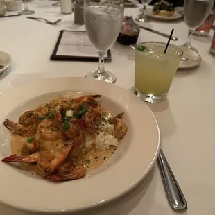 Shrimp with Cajun sauce over a bed of mashed potatoes. We created this special meal. So good! Awesome sous chef. Margaritas are fab!