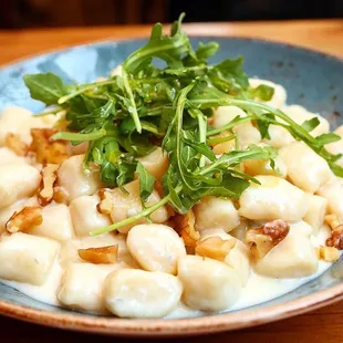 Homemade gnocchi, Gorgonzola, walnuts and baby arugula.