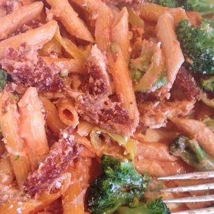 'West 224' - penne pasta with panko breaded chicken and broccoli in spicy pink sauce with hot peppers. Delish.