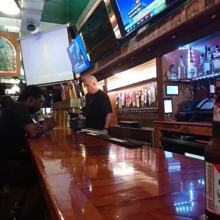 a man sitting at the bar