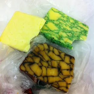 Sage derby, porter cheddar, and whiskey cheddar.