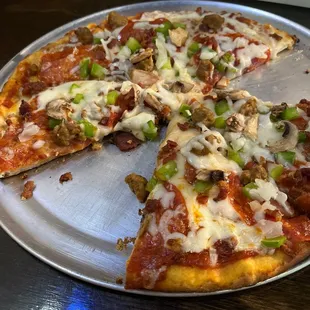 Loaded pizza on a prebaked cracker crust.  The toppings were good but the crust was tasteless.