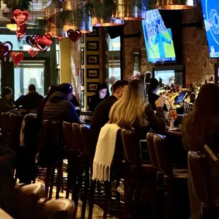 people sitting at a bar