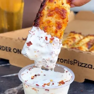 Cheesy Pizza Sticks Cheesy deep dish breadsticks with cranch (ranch) dipping sauce  Cheesy bread Ranch dressing